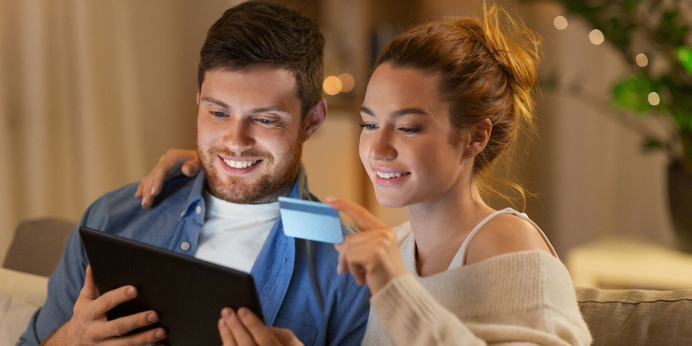 Couple using credit card online